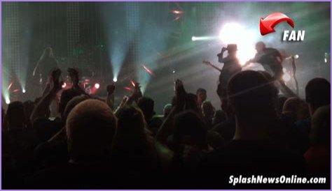 Motley Crue Guitarist Mick Mars Knocked Over Onstage by Crazed Fan